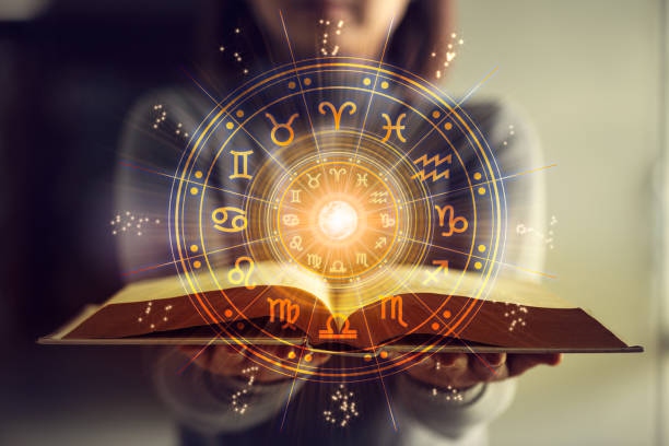 Woman Holding A Astrology Book A