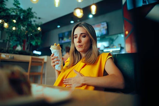 Woman Holding A Shawarma Feeling