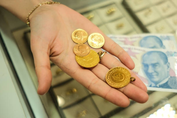 Womans Hand Holding Turkish Gold