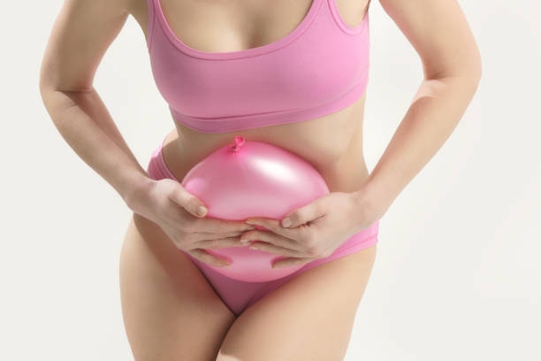 Young Woman Holding Balloon As A
