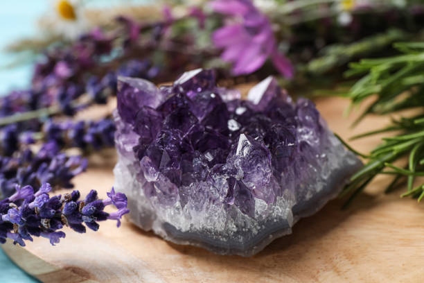 Amethyst And Healing Herbs On Wo