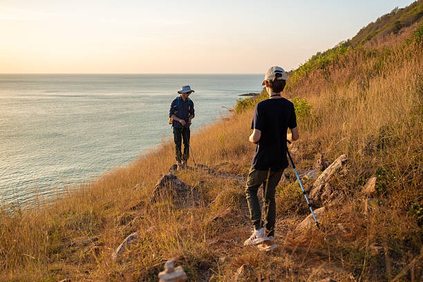 Tourists With Backpacks Hike On