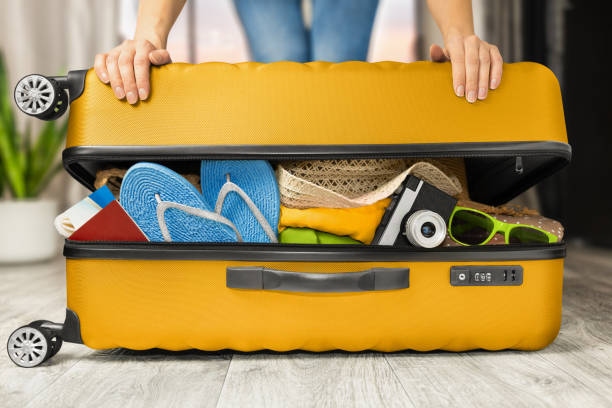 Woman Packing Suitcase