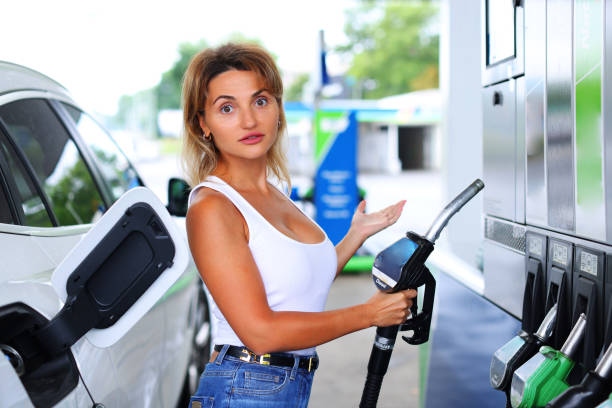 Woman Refueling Car At Self Serv-1