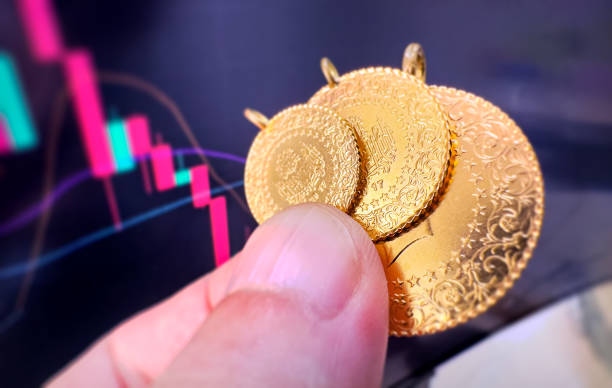 Human Hand Holding Turkish Gold-1